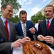 U.S. astronaut Tom Marshburn, Russian cosmonaut Roman Romanenko and Canadian Hadfield break bread, 2013.